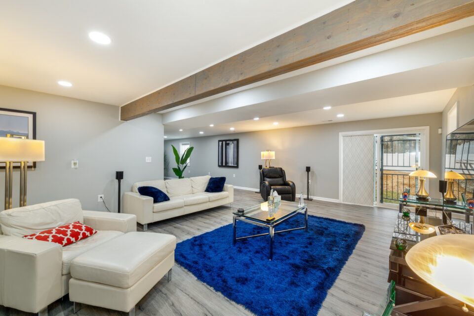 Open Concept Lower Level Media - Open-Concept Lower-Level Living & Custom Media Suite by Sam's Remodeling