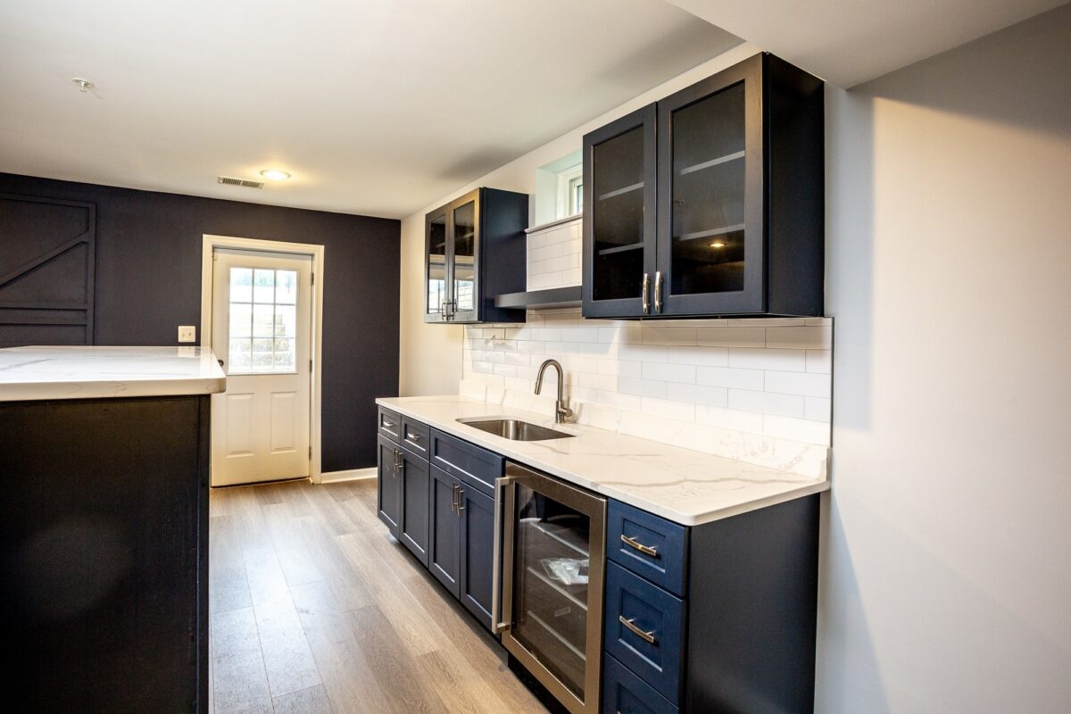 Basement Wet Bar Beverage Center - Modern Atlantis Basement & Geometric Accent Wall Lounge by Sam's Remodeling