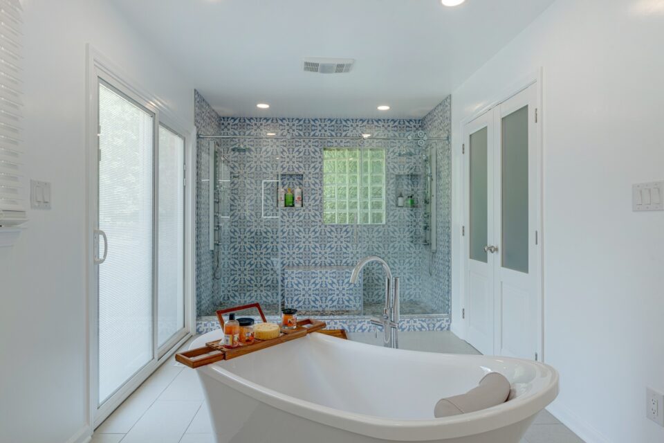 Mediterranean Spa Freestanding Tub - Mediterranean Spa Retreat & Curbless Multi-Jet Shower by Sam's Remodeling