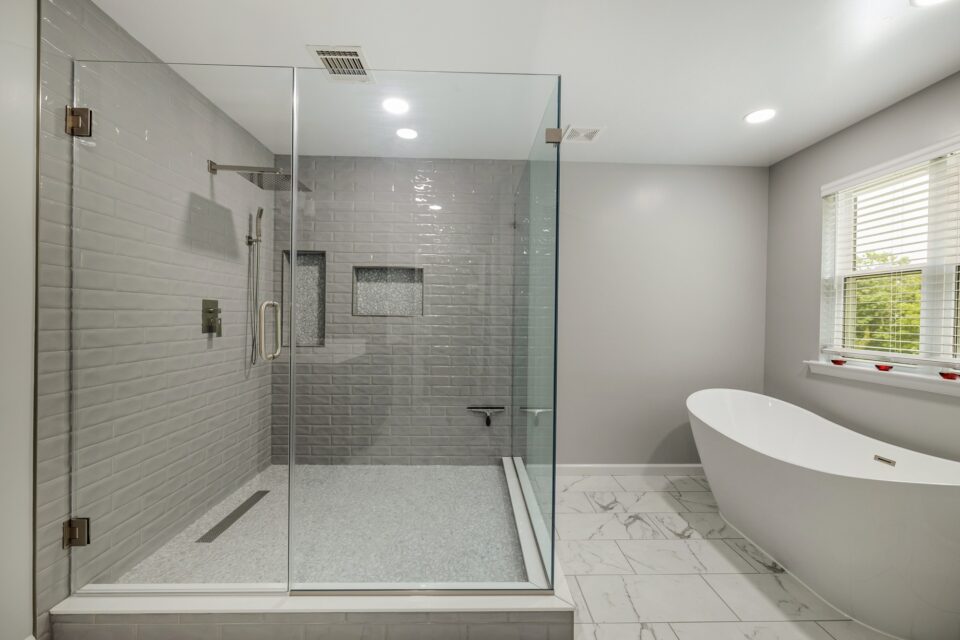 Frameless Glass Shower Soaking Tub - Contemporary Primary Bath & Frameless Walk-In Shower by Sam's Remodeling